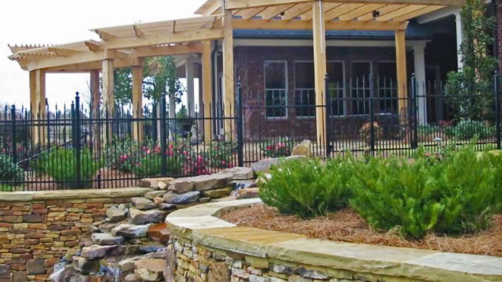 Jackson, MS home hardscaped and landscaped by Ambiance Landscape.