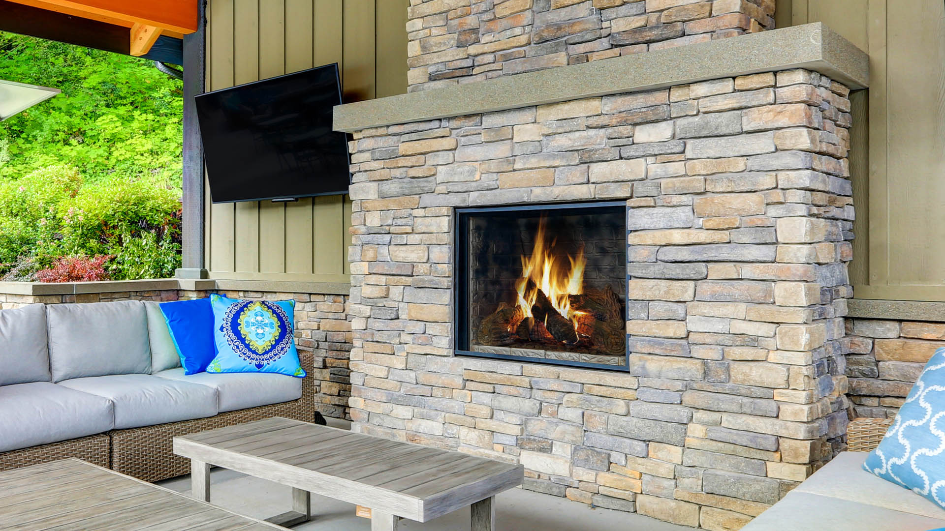 Outdoor fireplace and living areas.