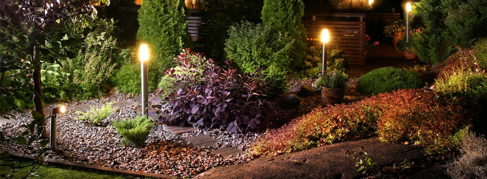 Residential home walkway with outdoor lighting installed by Ambiance Landscape in Brandon, MS.